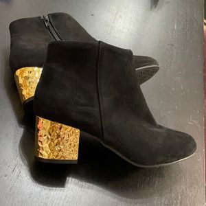 Cute black booties with gold accent heel